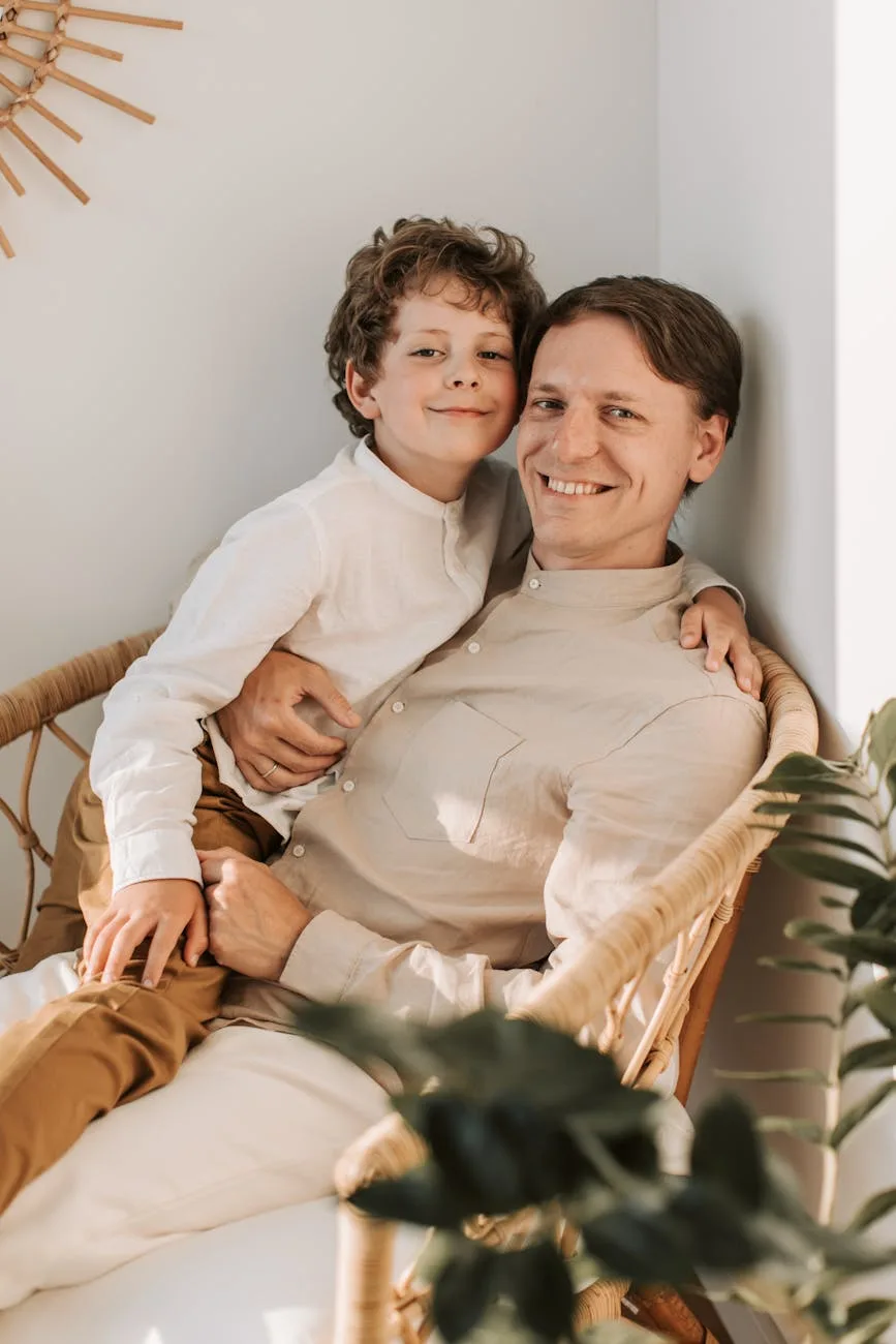 father sitting with his son